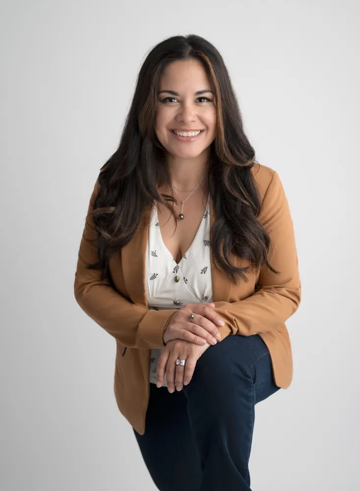 Michelle Bucholtz, Métis artist, wearing a Métis sash